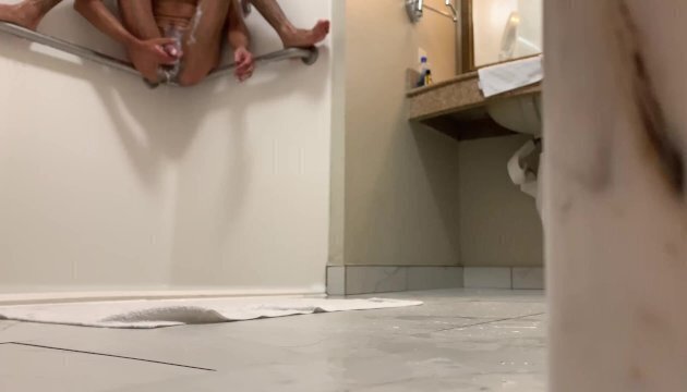 peeping under door shower scene James Bond move