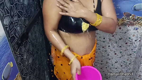 Indian Desi Bhabhi Bathing Removing sexy saree.