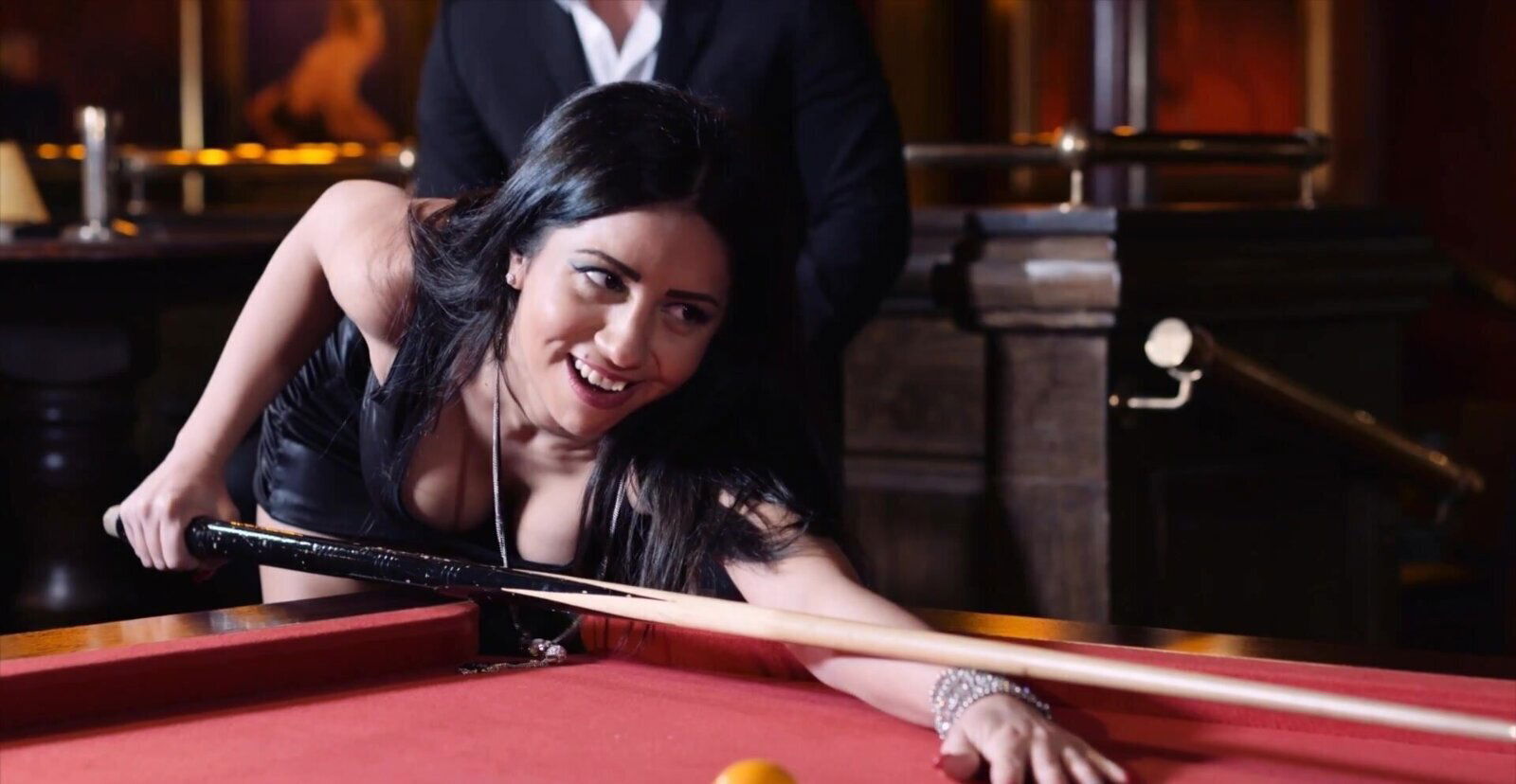 Brunette Julia Lucia moans while getting slammed from behind