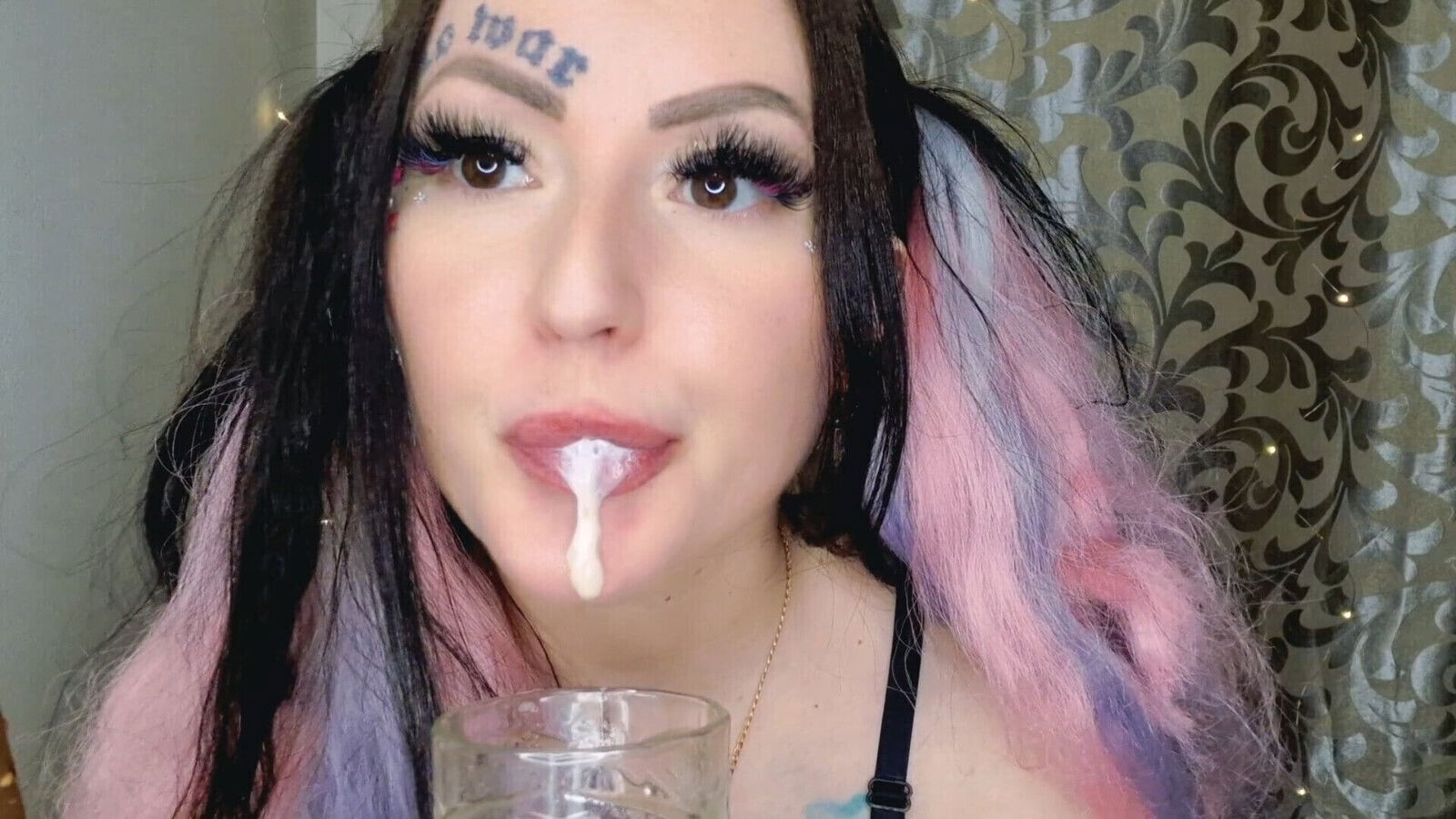 Dominatrix Nika spits into glass