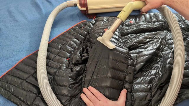 Cleaning Dark Shark G.W. Down Jacket with Vintage Electrolux Vacuum Cleaner