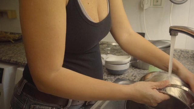 Washing dishes jeans with belt