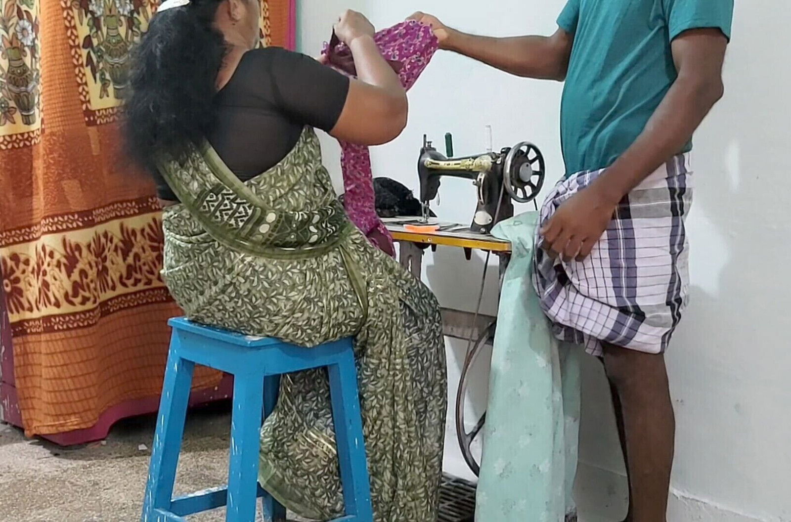Mother Sewing Clothes with Helping
