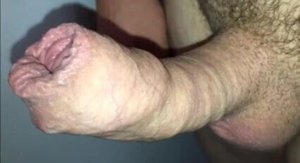 Dad's uncut cock growing and spunking on cam