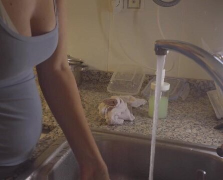 Washing dishes gray leggings