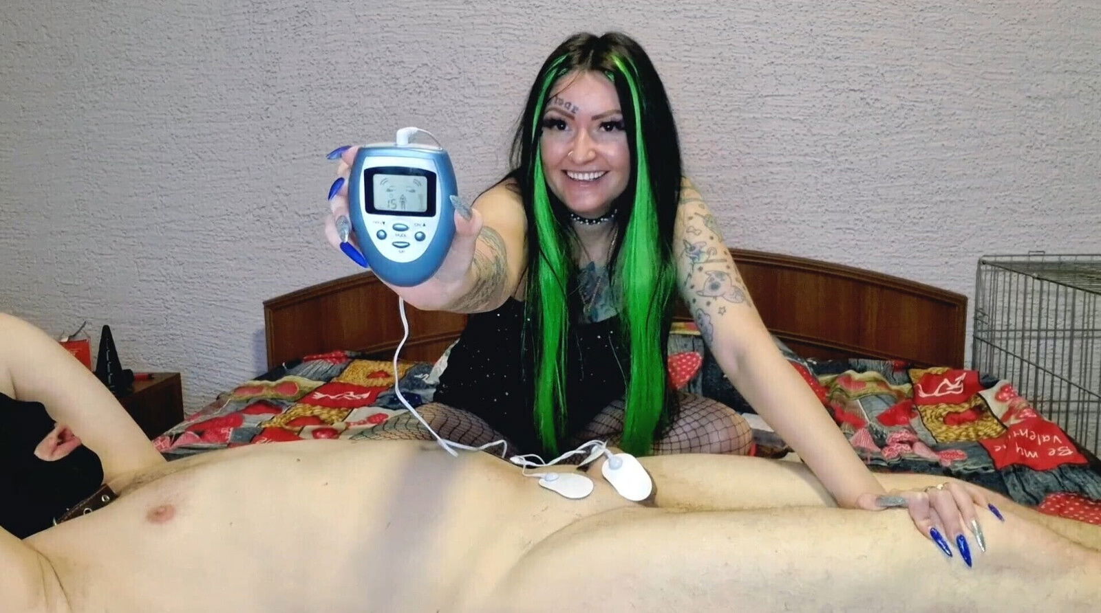 Electrostimulation penis testicles. Dominatrix Nika plays with electric discharges genitals slave