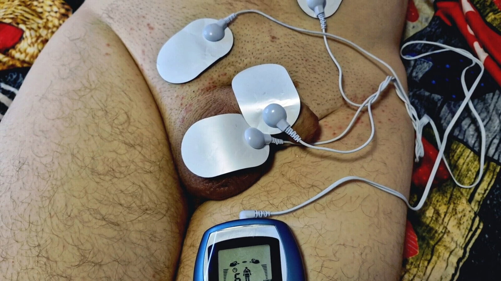 Dominatrix Nika plays with electric discharges genitals slave. Electrostimulation BDSM