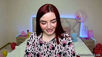 Redhead amateur babe strips pajamas and shows tattoo on webcam