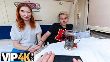 VIP4K. Young redhead does strangers attention train