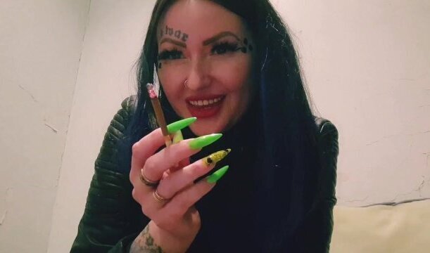 Sexy cigarette smoking. Smoking fetish from beauty.