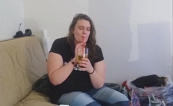 Layla drinks full glass piss using straw