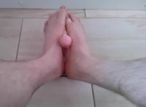 Giving footjob