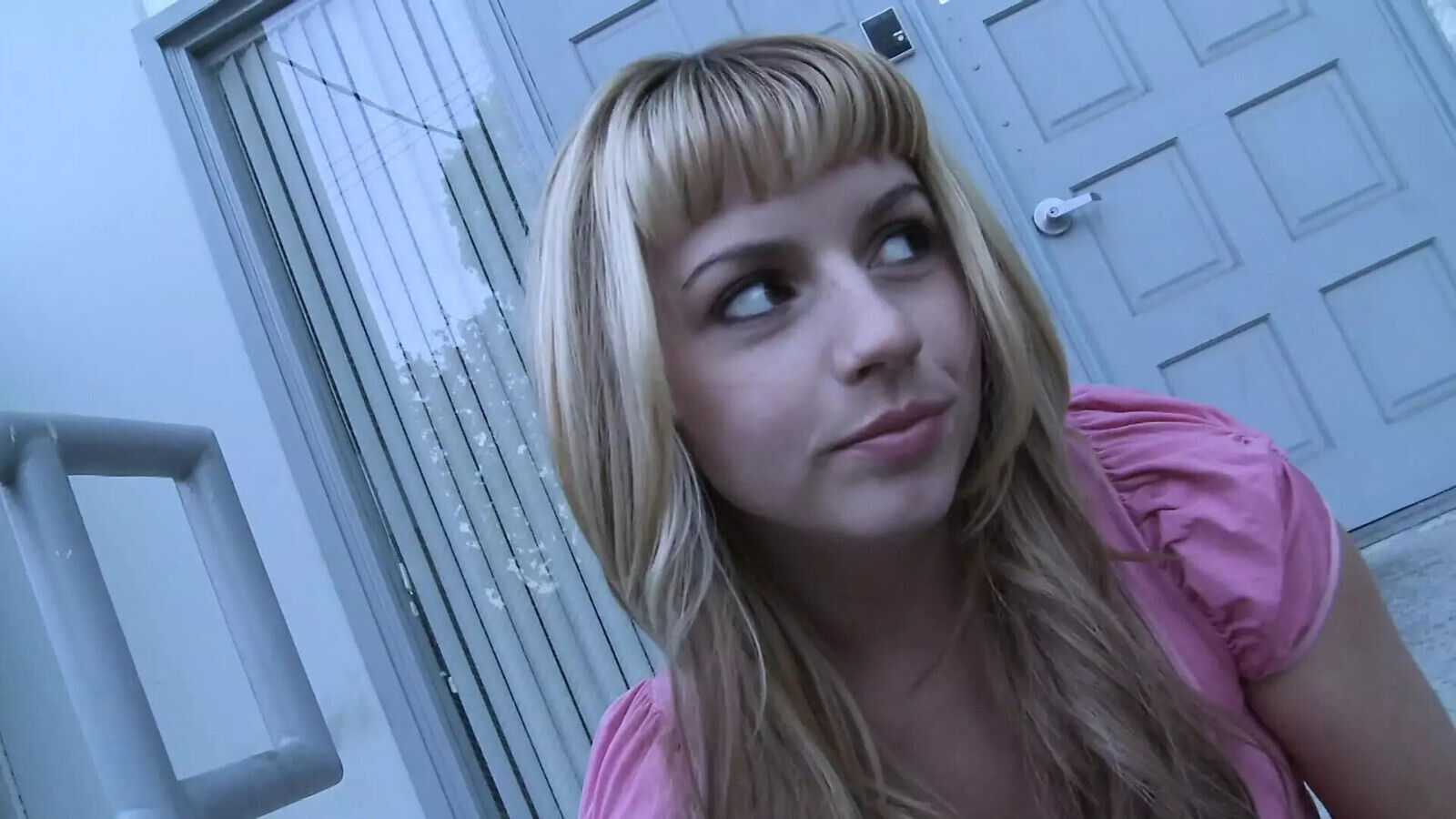 Two blonde lesbians fill their pussies with colorful dildos in bed