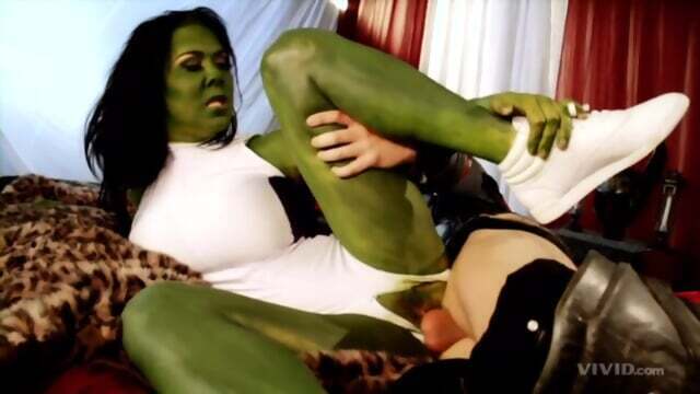 Green Alien With Costumed Hippy