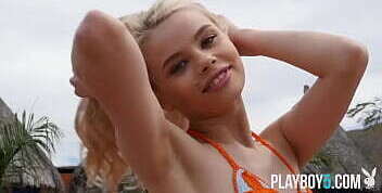 Tiny blonde teen Playboy model exposes petite body outdoor