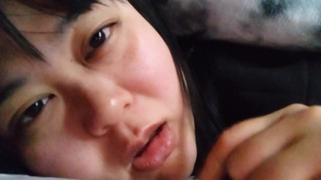 facial expression Japanese woman while masturbating.