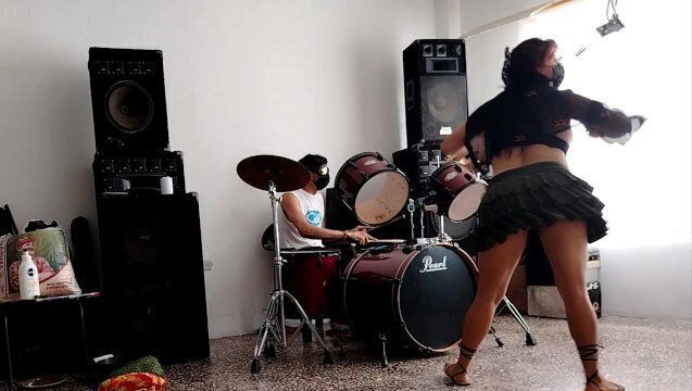 They play drums dances, stripping showing