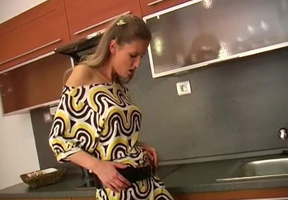 Enticing Lenka Janistinova stripping in the kitchen feeling slutty