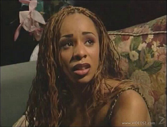 Adorable ebony moaning while her shaved pussy is feasted missionary on sofa