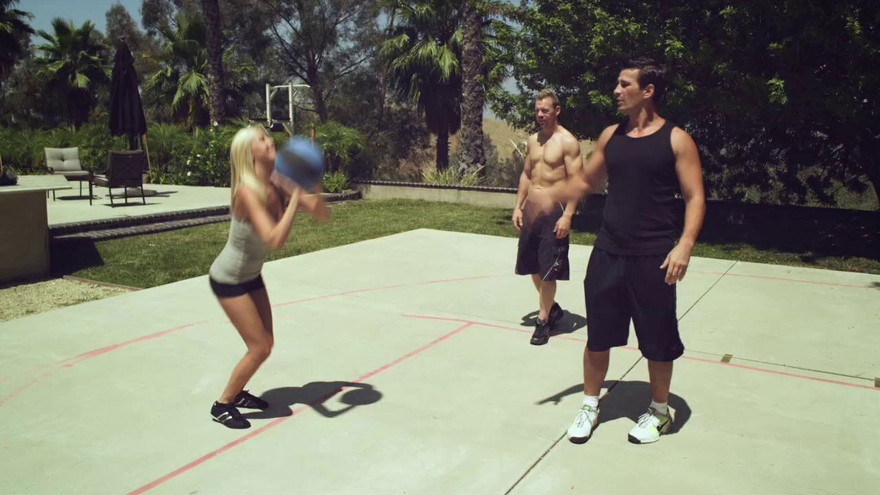 Playful brunette in shorts enjoys doggystyle pounding in close up clip