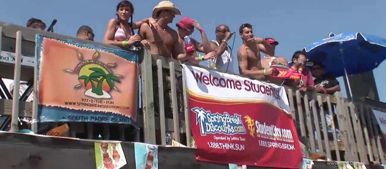 Amateur bitches wearing bikinis flash their tits on a beach