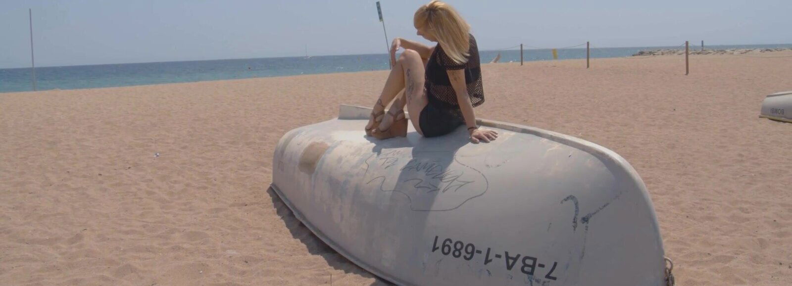 sexy blonde Perla Rubia beach fishnet outfit