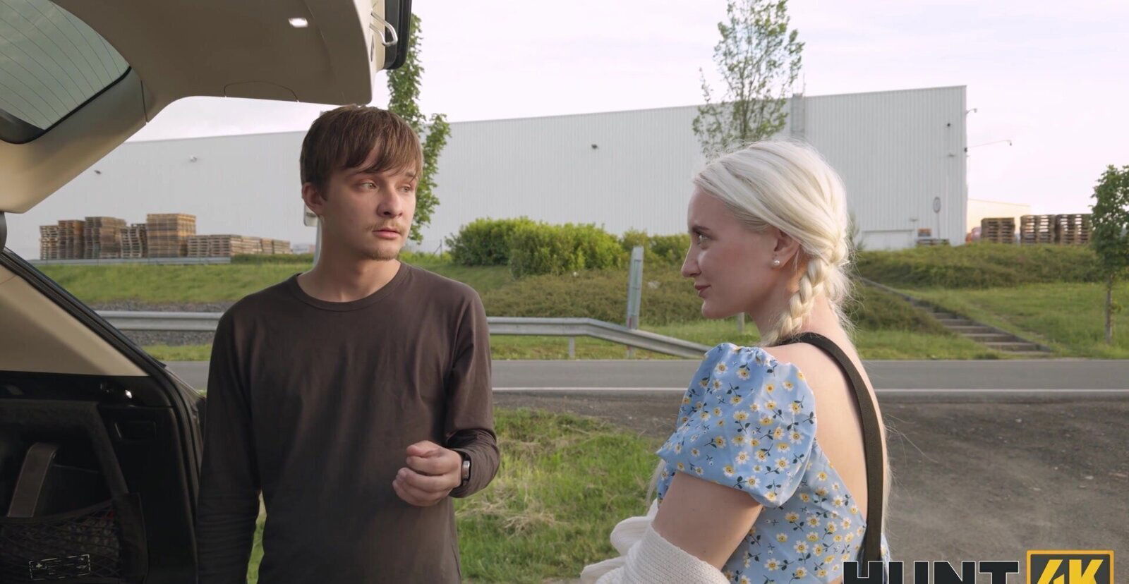 blonde beauty with boyfriend car, showcasing Daruma Rai’s passion.