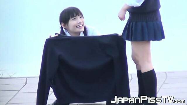 Perv voyeur captures these Japanese schoolgirls peeing outdoors