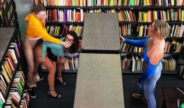 brunette with glasses gave student library