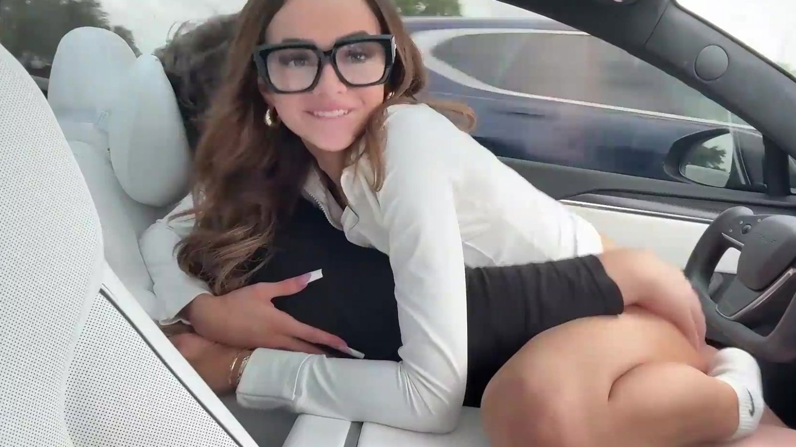 Cute glasses gives head gets fucked during driving