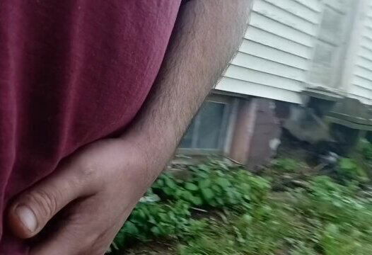 Sean walkin around yard pisses