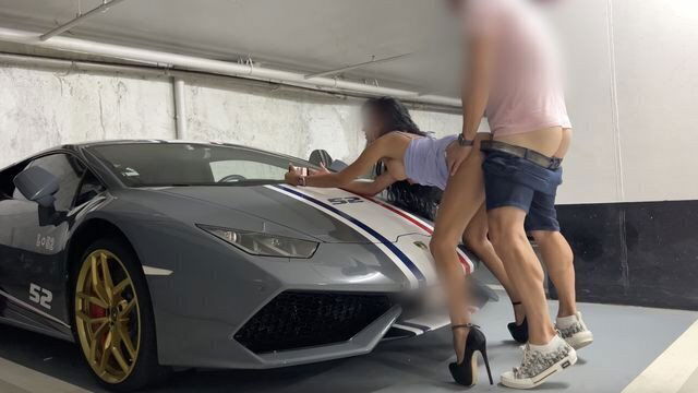 Luxury whore gets fucked client against hood Lamborghini