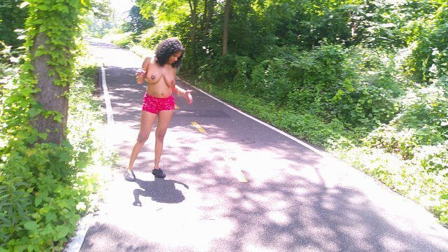 SOLO FEMALE OUTSIDE BIKE TRAIL JUNGLE BIKER