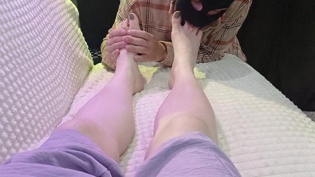 slave licks mistress's feet