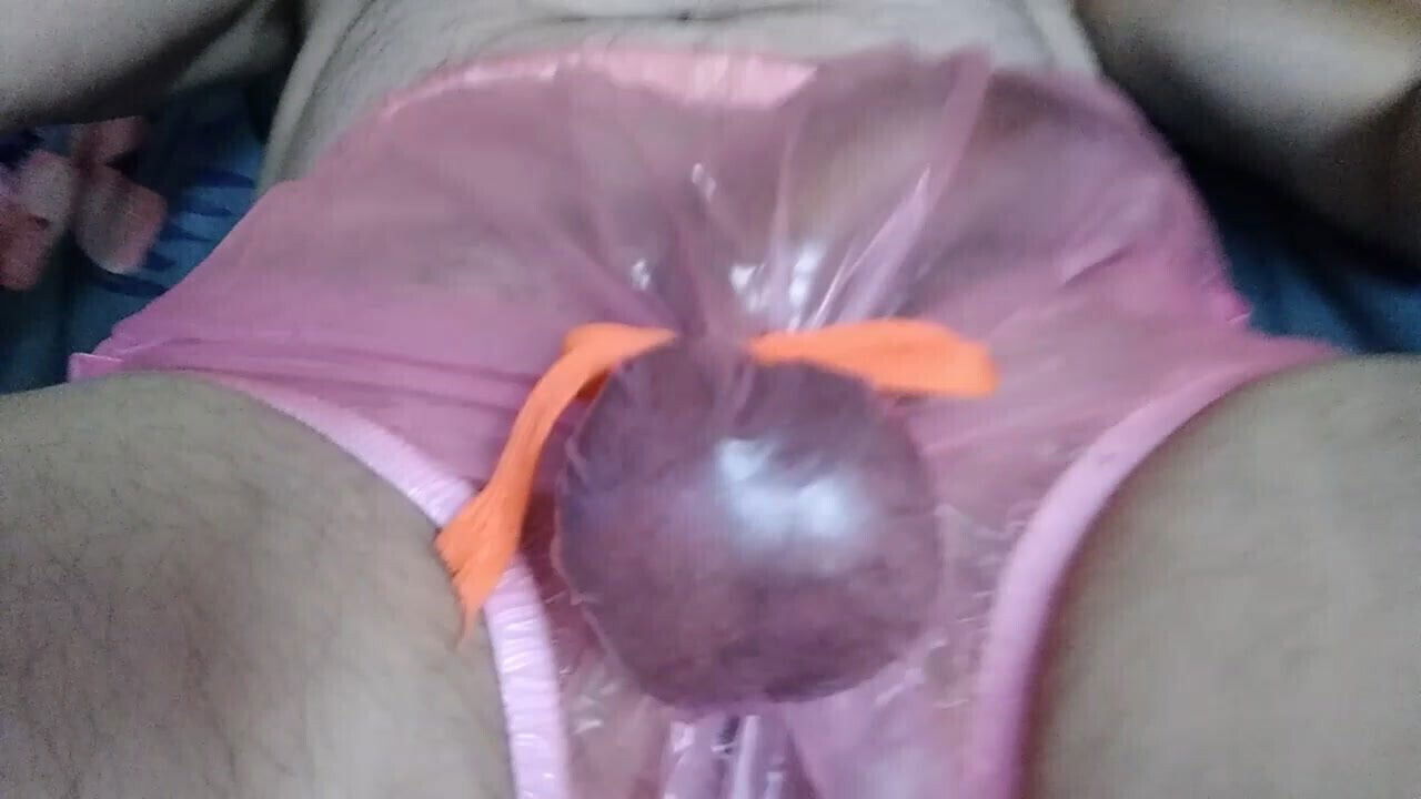 rubber pants gets ball beaten with wooden spoon