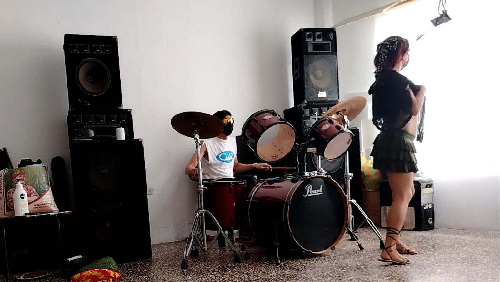 They play drums dances, stripping showing