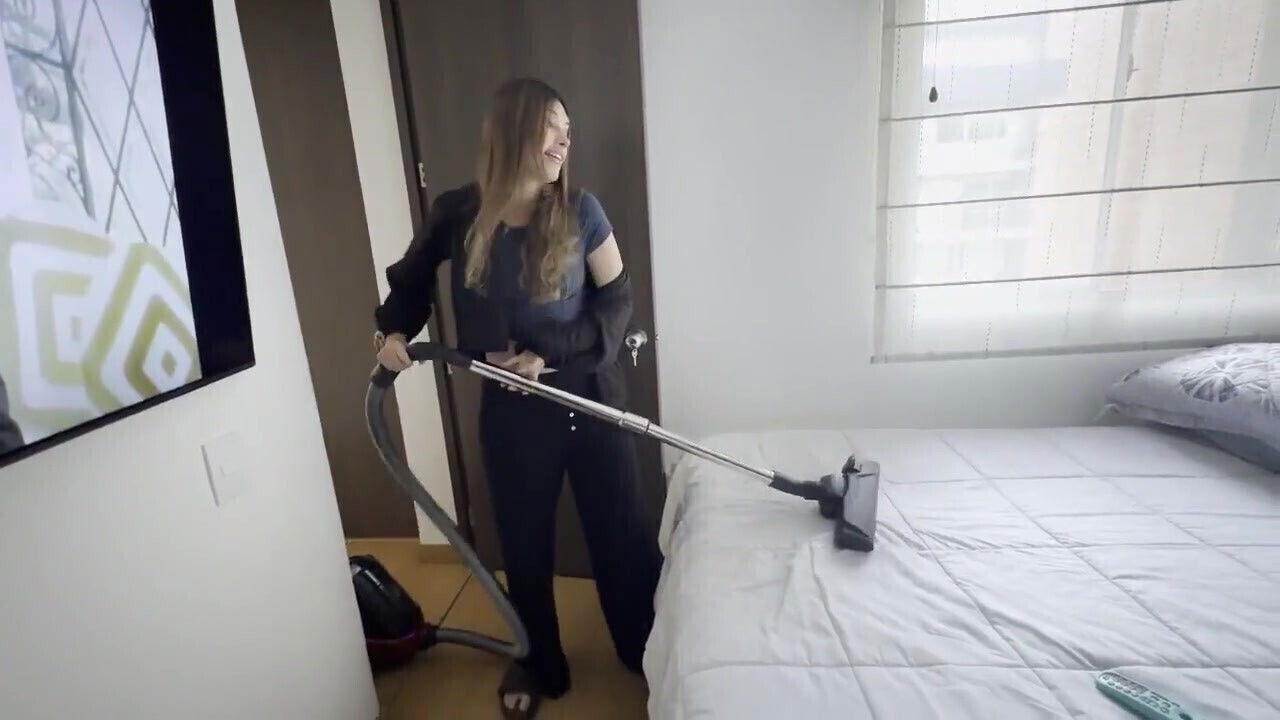 Turns Employee Vacuuming House That's Doing Scissors with Eating Cone.