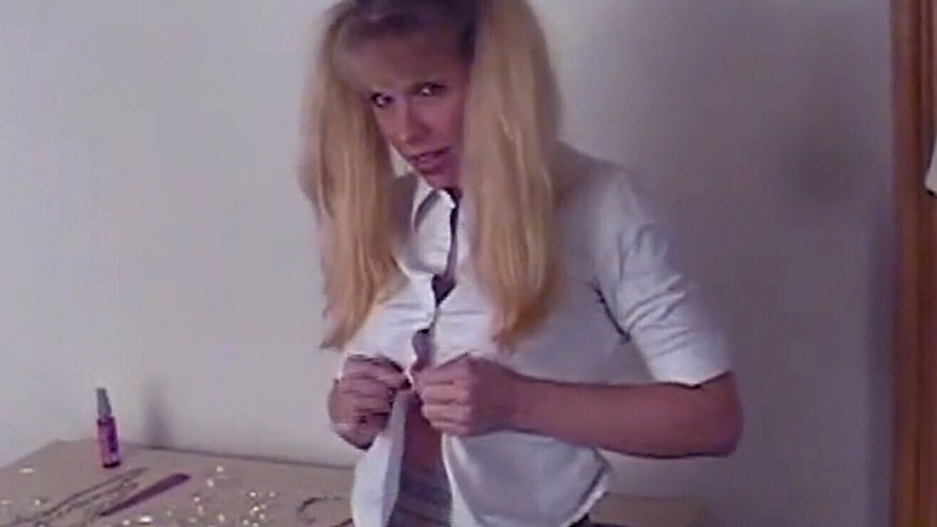 Blonde with playful ponytail lips wrapped around small