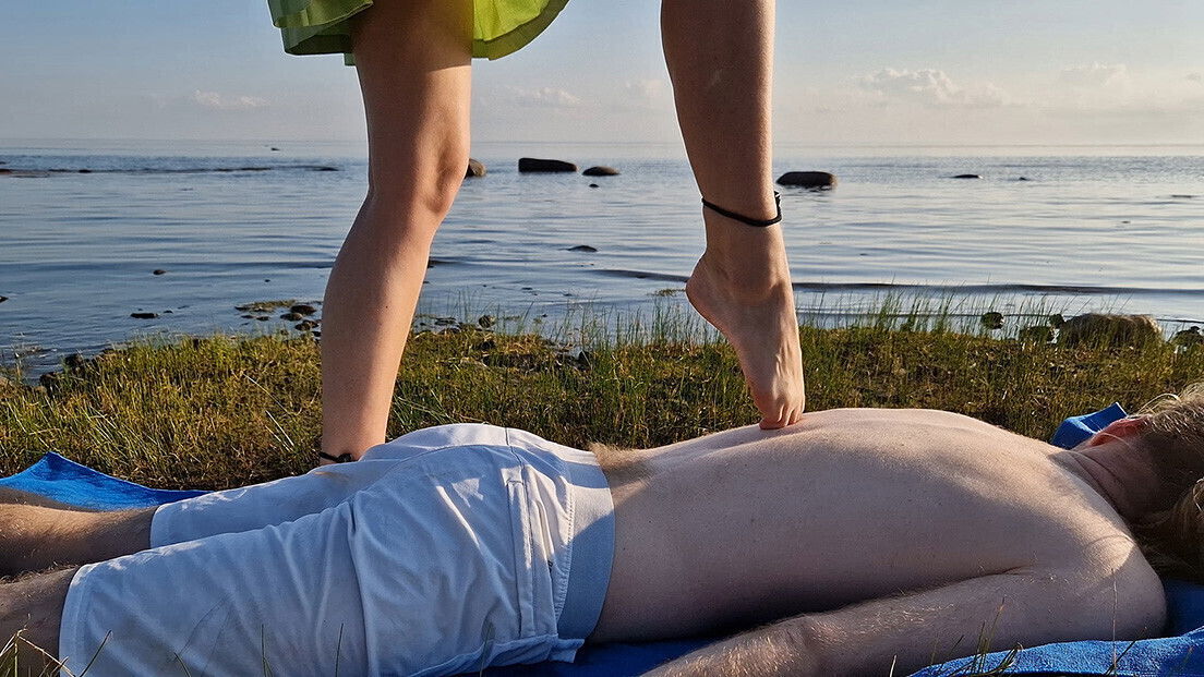 Foot massage girl with long toes, long slim legs skirt