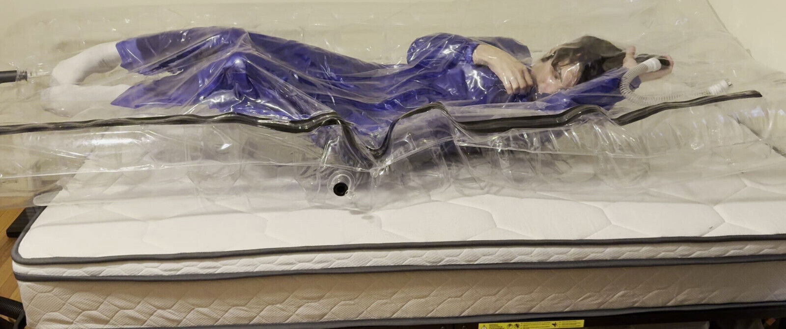 VacPacked Mike wearing apron overalls