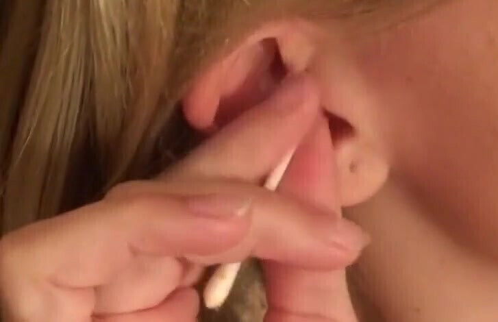 Cleaning ears with q-tips