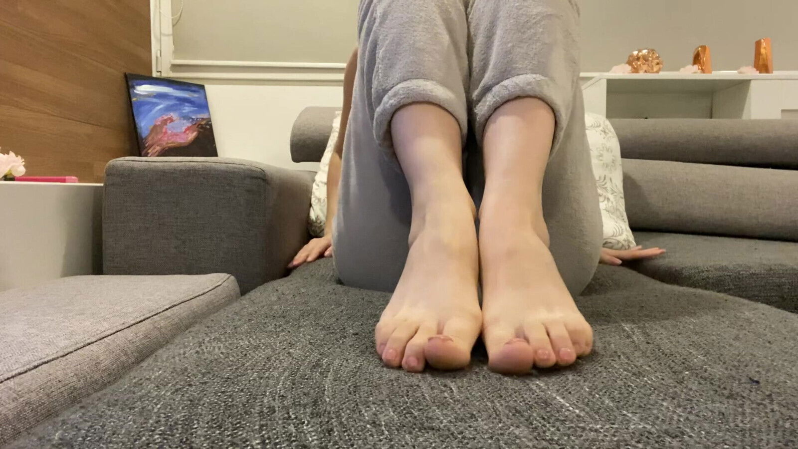 Bare long feet lick look
