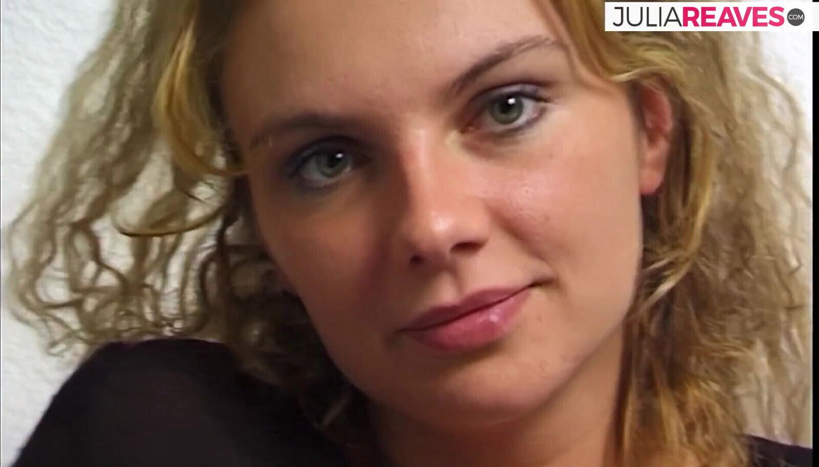 Blonde girl strips spreads legs