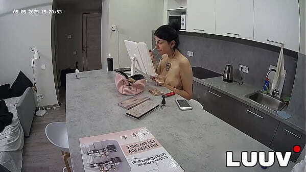 LUUV. After their argument, Alice does makeup while Lucien watches lovingly