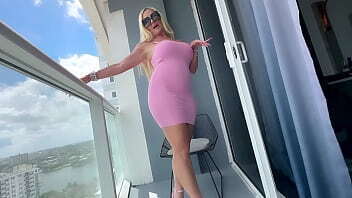 Beautiful Blonde shows curves tiny pink dress