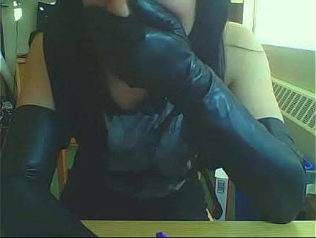 Girl putting long leather gloves