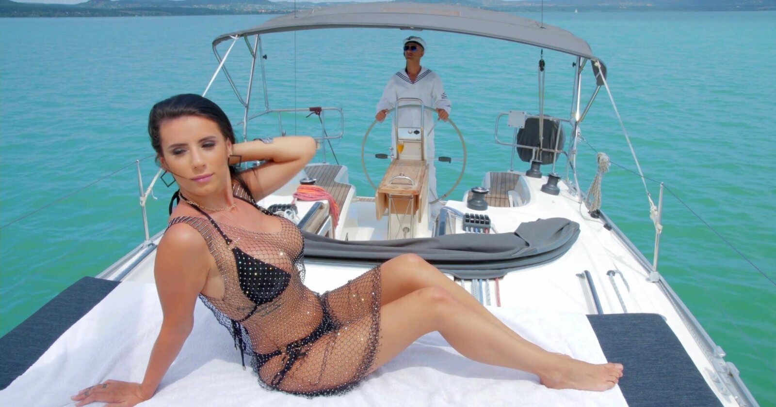 couple enjoying yacht with stunning Nelly Kent