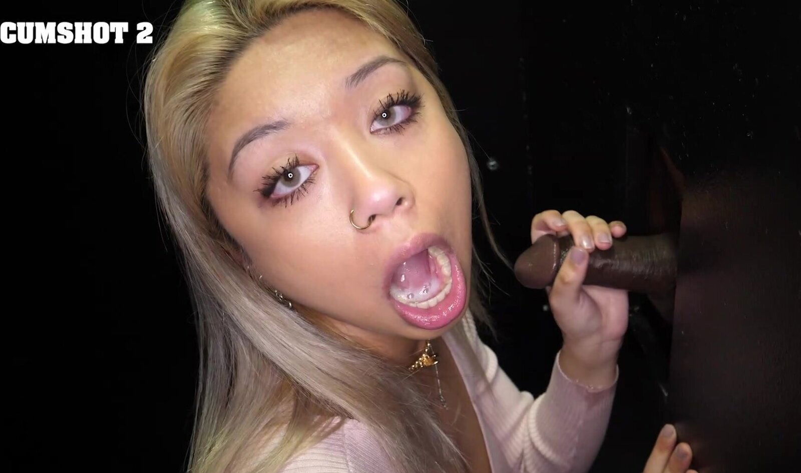 Blonde Dibella swallows stranger through gloryhole.