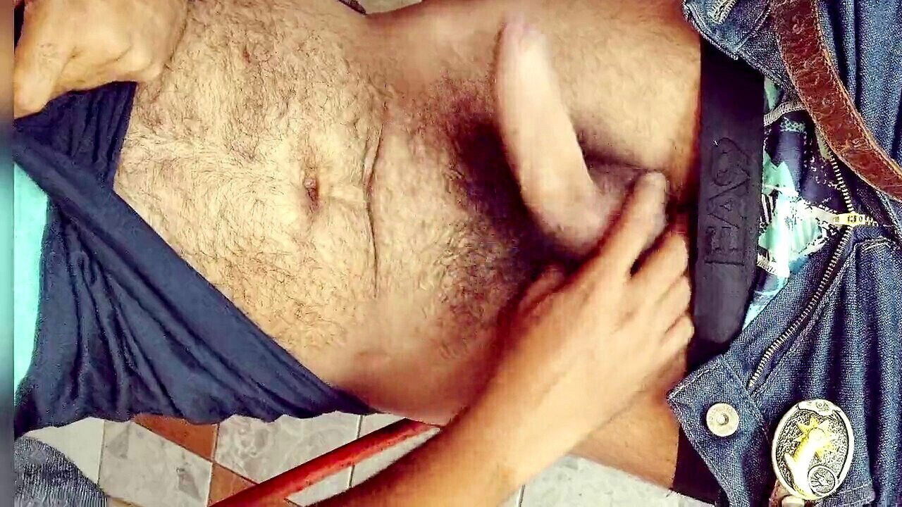 Hairy redneck Stink Hairymale smokes while rocking jeans