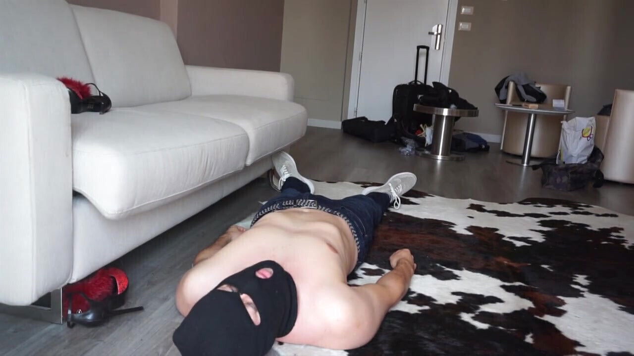 Femdom chick starts walk around body